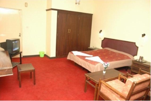 Hotel Preethi Palace Ooty Oda fotoğraf