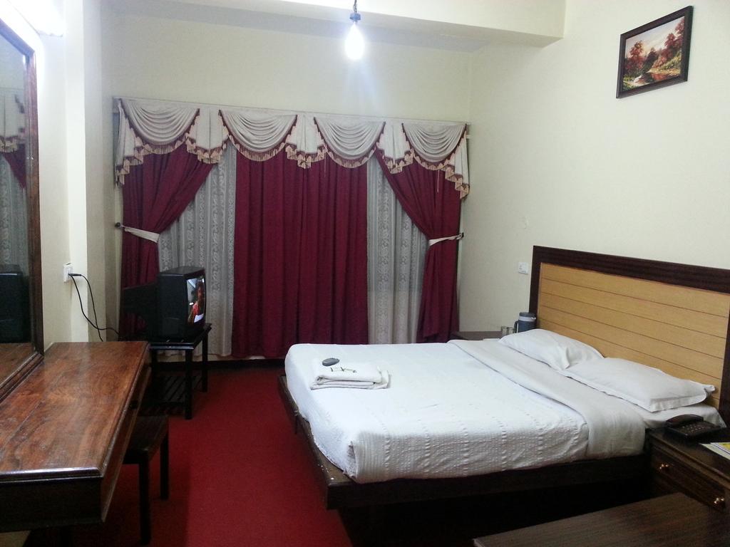 Hotel Preethi Palace Ooty Oda fotoğraf